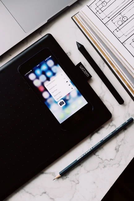 Detailed close-up of a hand-drawn wireframe design on paper for a UX project.